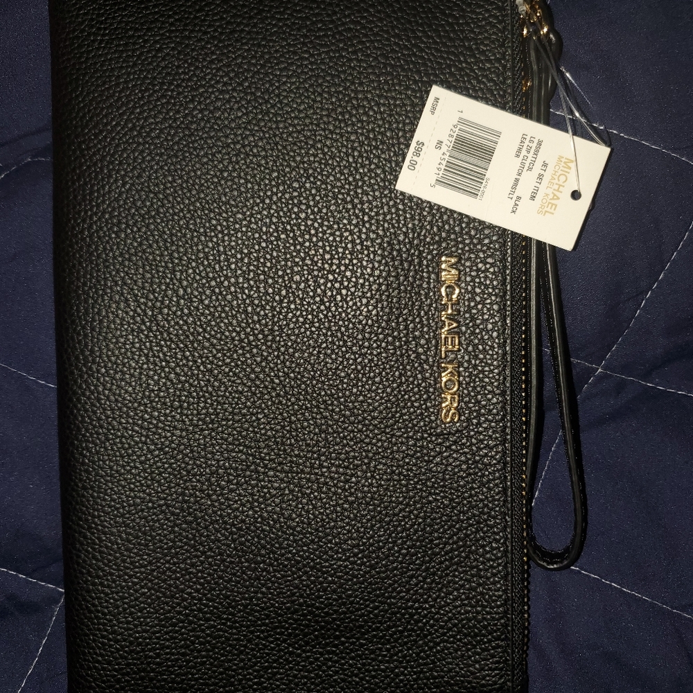 Brand new Michael kors wristlet